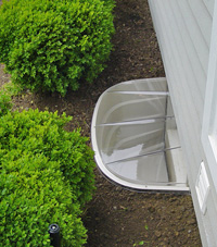 basement egress window well in Winona