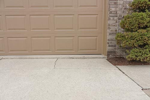 Uneven Garage Concrete in Duluth Superior Area