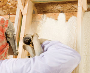 Spray foam insulation being installed by a certified professional in Minnesota and Wisconsin