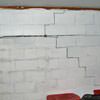 A buckling foundation wall in a Duluth home.