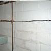 Severe foundation damage from a long crack in a bucking wall of a Eau Claire home.