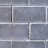 A diagonal stair-step crack found along a foundation wall in a Duluth home