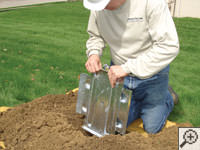Steel earth anchor assembly installation in Duluth.