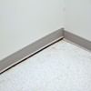 A partition wall separating from the floor in a Hibbing home.