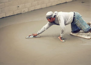 smoothing out the grout in a slab releveling project in Duluth