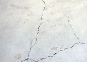 cracks in a slab floor consistent with slab heave in Eau Claire.