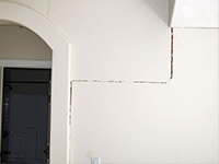 Drywall cracking due to foundation settlement in Saint Cloud