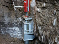 Foundation repair contractors lifting a structure in Eau Claire.