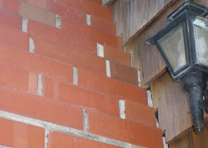 a repaired chimney in Duluth that had shown serious foundation damage and was repaired with a helical pier system.