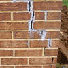 Tuckpointing that cracked due to foundation settlement of a Superior home