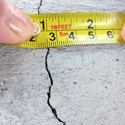 A crack in a poured concrete wall that's showing a normal crack during curing in Eau Claire