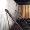 Temporary foundation wall supports stabilizing a Eau Claire home