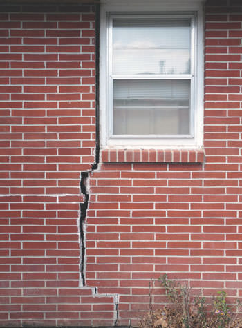 severe foundation wall cracks along a window in Hibbing