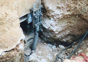 a bent, failed foundation push pier installed in Eau Claire.