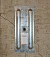 A fully exposed wall anchor plate installed along a Bemidji foundation wall
