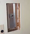 Wall anchor plates installed during a foundation repair in Hibbing in a finished basement