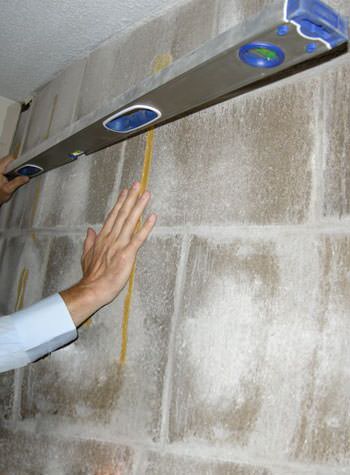 severe foundation wall failure symptoms of a basement wall in Duluth