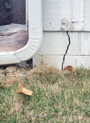 foundation wall cracks due to street creep in Grand Maris