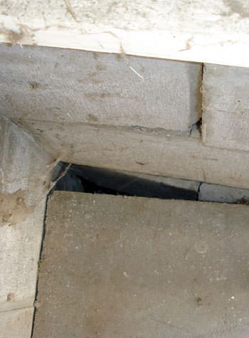 inward rotation of a foundation wall damaged by street creep in a garage in Mountain Iron