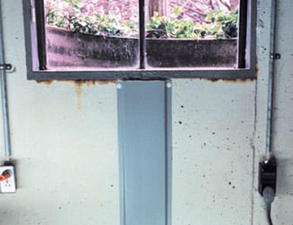 Repaired waterproofed basement window leak in Duluth