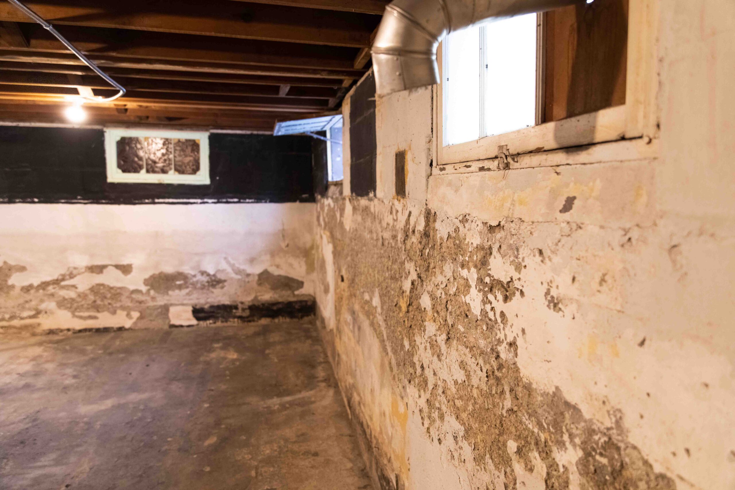 Bowing basement foundation wall before structural repair in Bloomington Minnesota