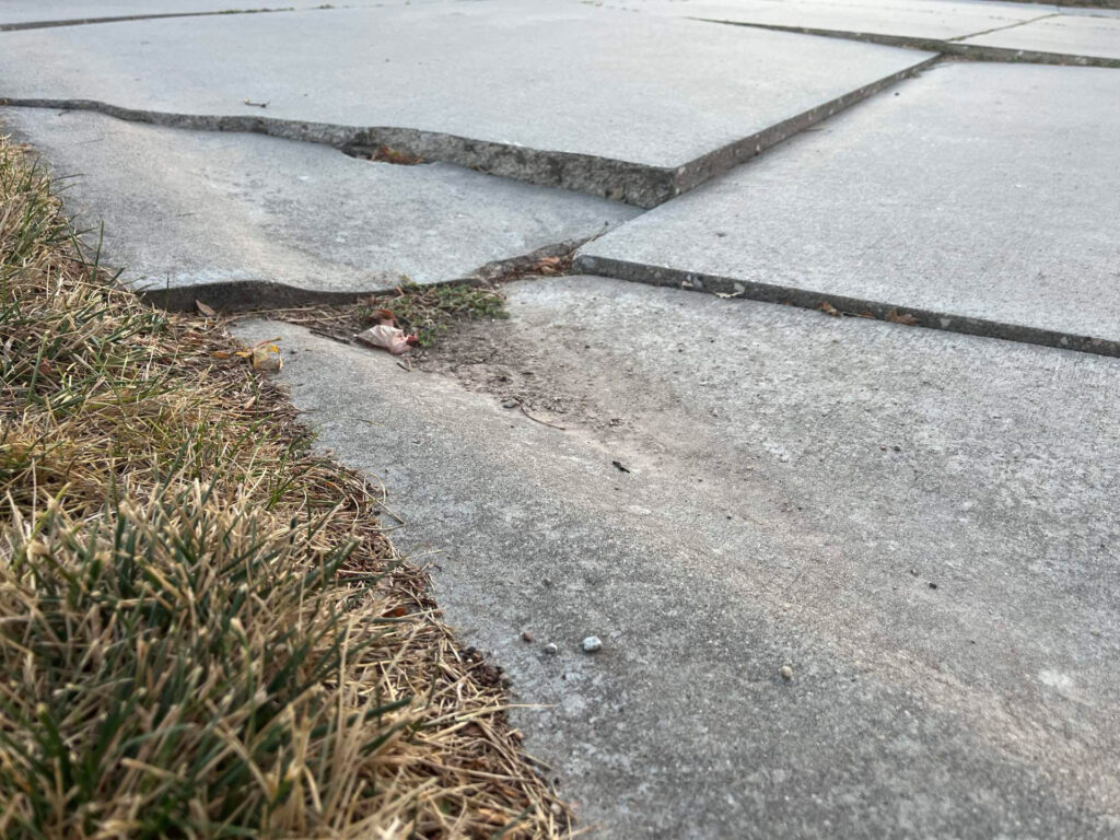 cracked-sunken-uneven-concrete