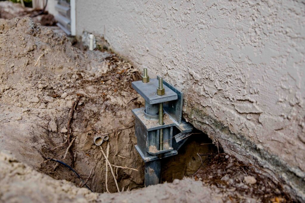 foundation-helical-pier-installation-closeup-st-paul-mn Foundation Repair Problems