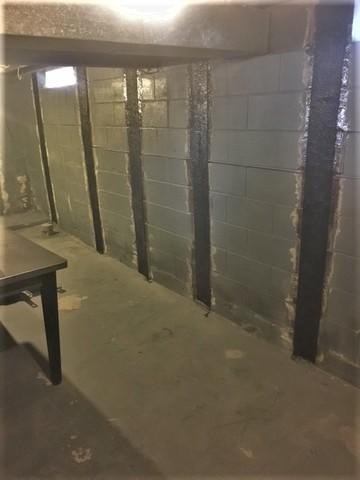 Completed foundation repair using CarbonArmor system in a Chaska MN basement