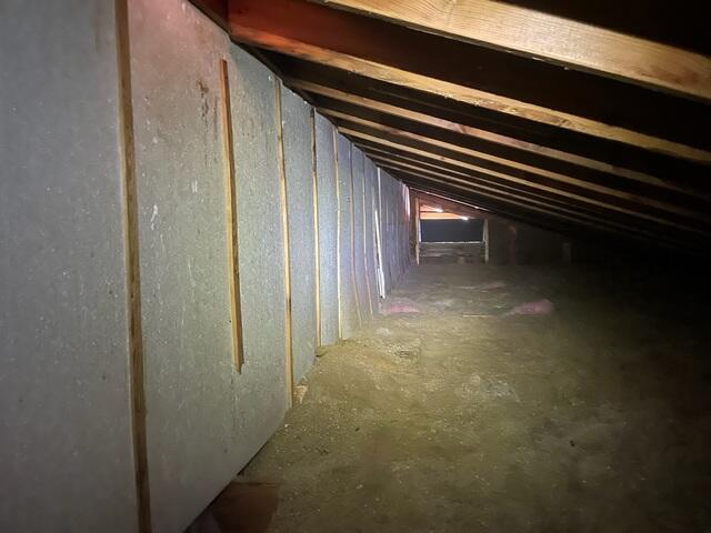 Attic with inadequate insulation before upgrade in Bemidji MN