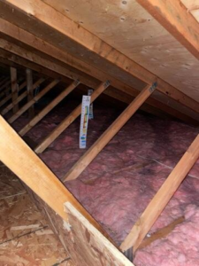 Attic with little insulation before upgrade in Hayward WI