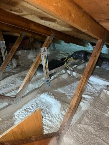 Completed attic insulation upgrade improving energy efficiency in Hayward WI