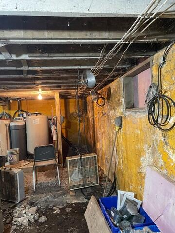 Damp, neglected basement walls in Wright MN before waterproofing