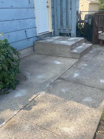 Perfectly leveled and stabilized concrete steps with sealed joints to prevent mice entry in Andover, MN.