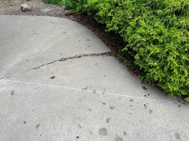Level and restored concrete pathway sealed with NexusPro in Hammond WI after repair