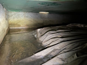 Crawl space conditions before encapsulation in Brule, WI