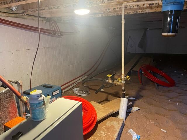 CleanSpace vapor barrier completely covering the ground and walls of a crawl space in Spooner Wisconsin