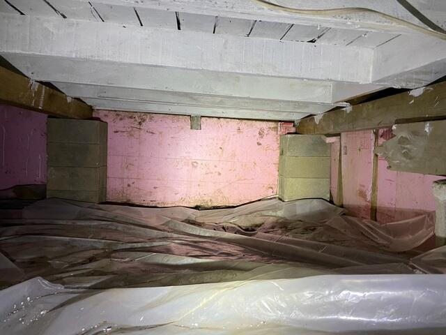 SaniDry Sedona high efficiency crawl space dehumidifier running inside a dry encapsulated foundation in Balsam Lake Wisconsin