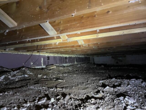 Moist crawl space conditions before repair in Brook Park, MN