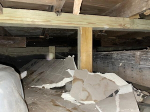 Damp crawl space before waterproofing near Menomonie, WI