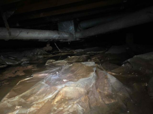 Wet crawl space before waterproofing in Superior, WI