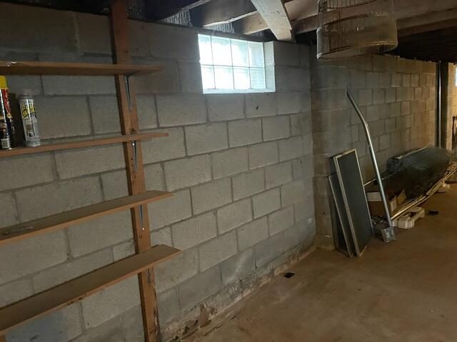 Bowing block basement wall in Ashland WI before foundation repair