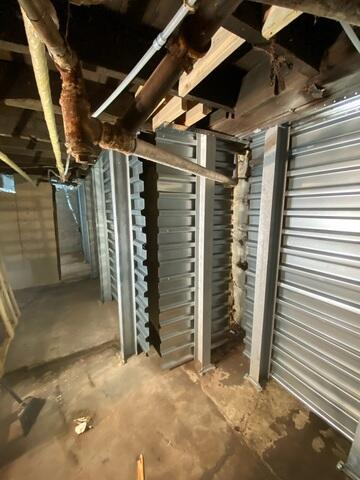 EverBrace corrugated steel panels and I-beams stabilizing a basement wall in Ashland WI