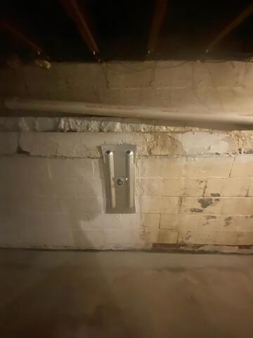GeoLock Wall Anchor installed to stabilize a basement wall in Cameron WI