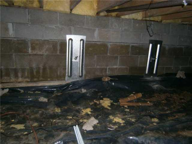 Geo-Lock Wall Anchors installed on a bowing crawl space wall in Cass Lake MN