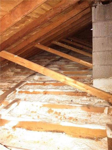 Closed-cell spray foam insulation installation in Carlton MN attic