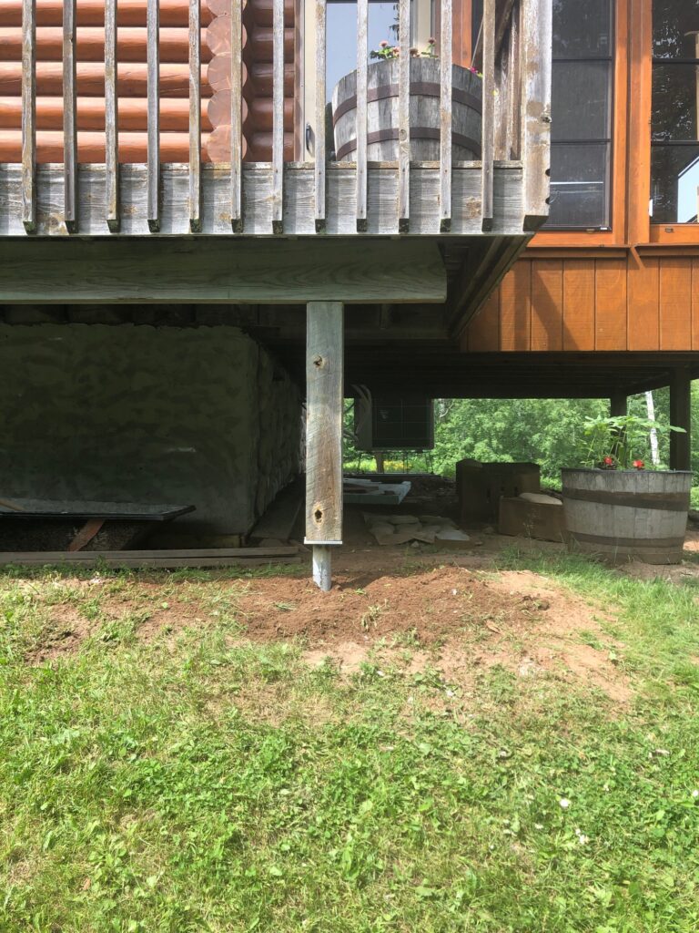 Porch support pier installed by DBS Repair in Rochester, MN