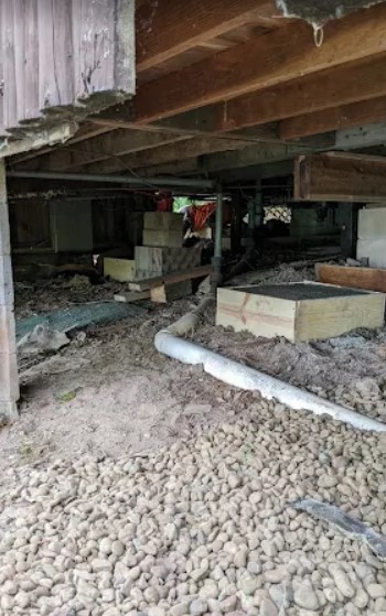 Cabin foundation showing structural support conditions before repair by DBS Repair